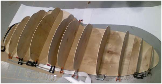 Wooden templates made by slicing up the CAD model